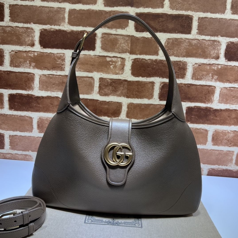G*u*i top handle bags
